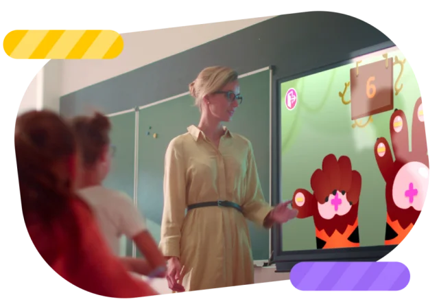 Teacher in class using Smart Tales on an interactive display.